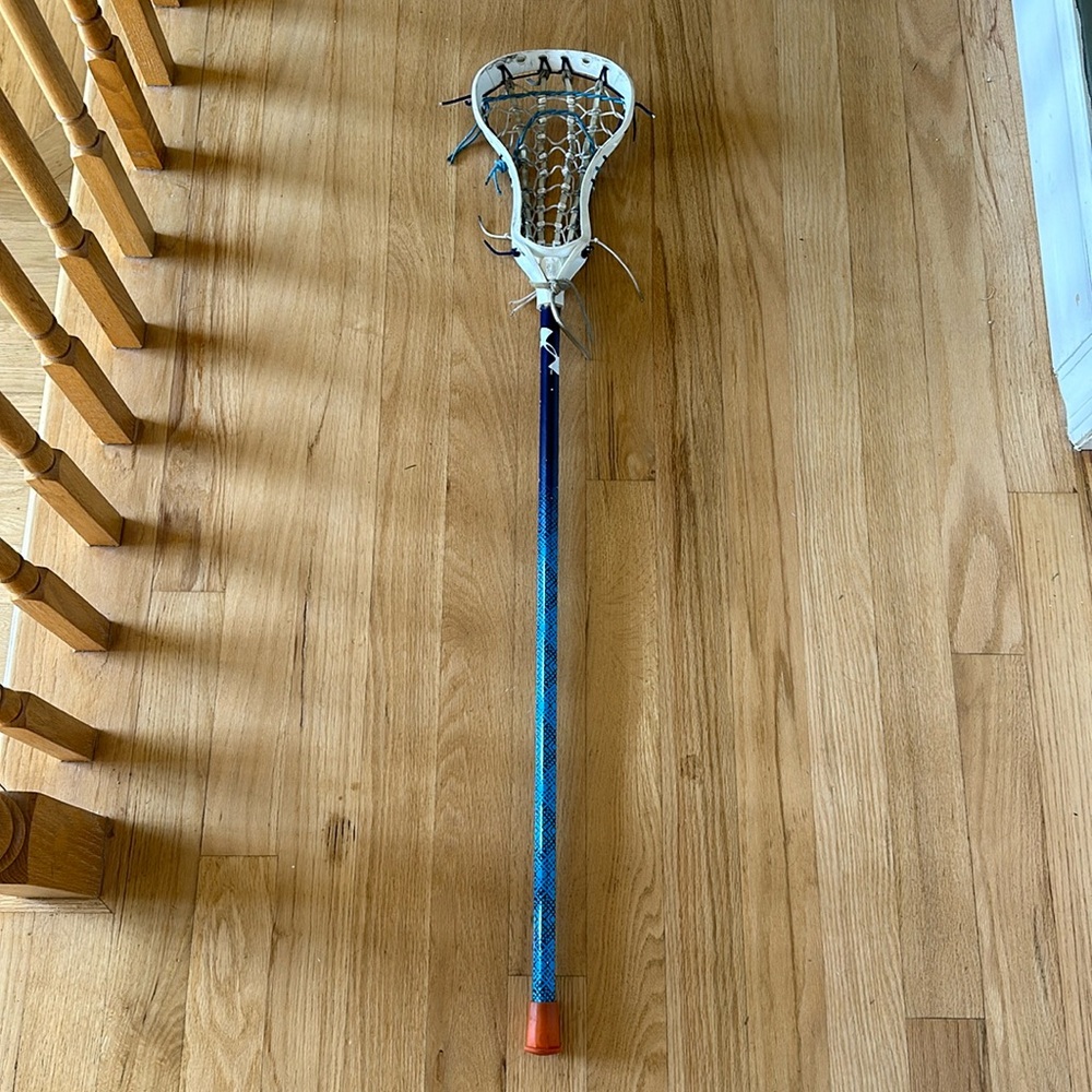 -Under armor lacrosse stick and warrior head fully strung-used